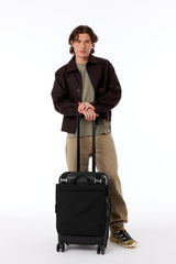Resale The Convertible Luggage Vest in Black