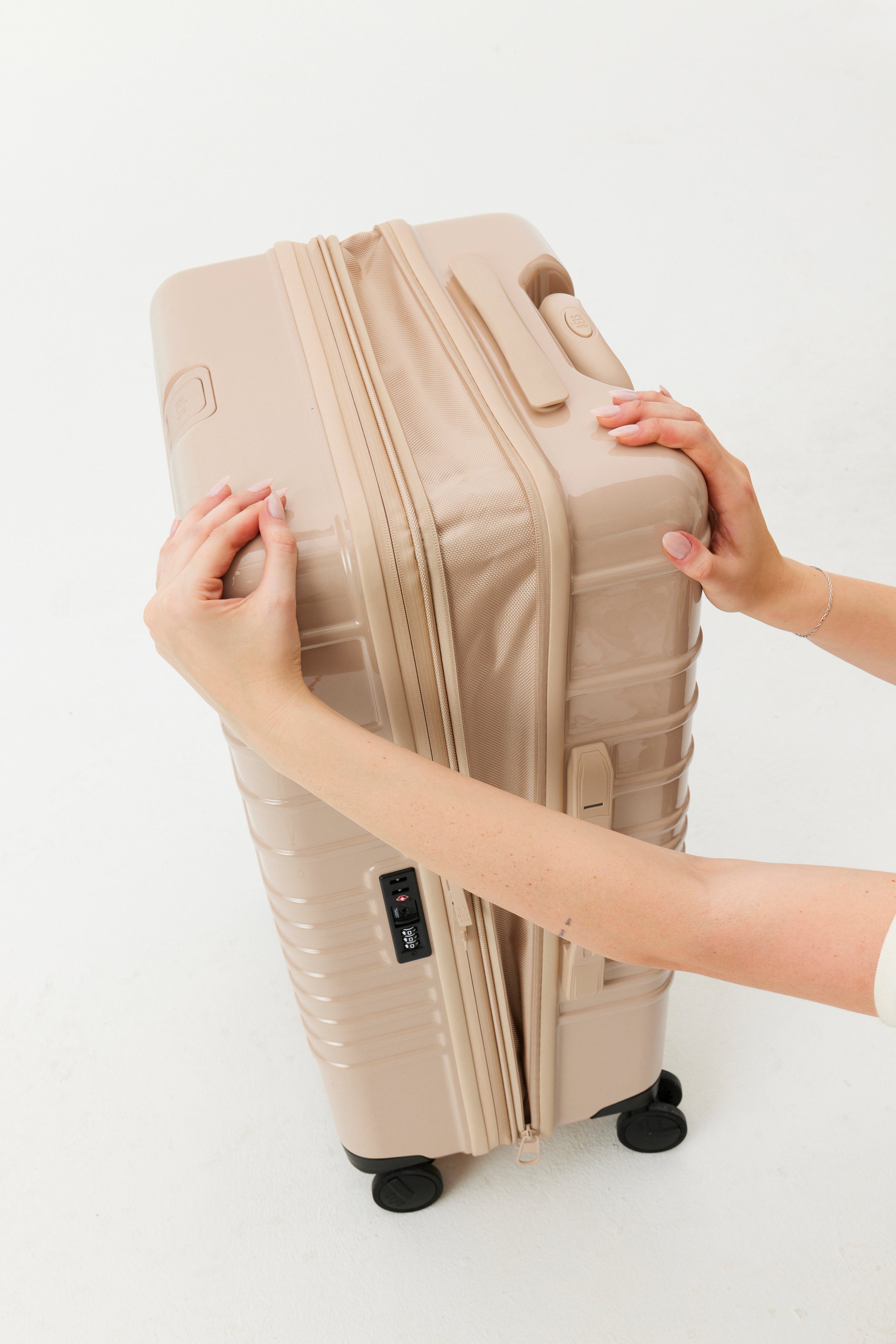 Resale The Medium Check-In Roller in Glossy Beige