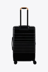 Resale The Medium Check-In Roller in Glossy Black