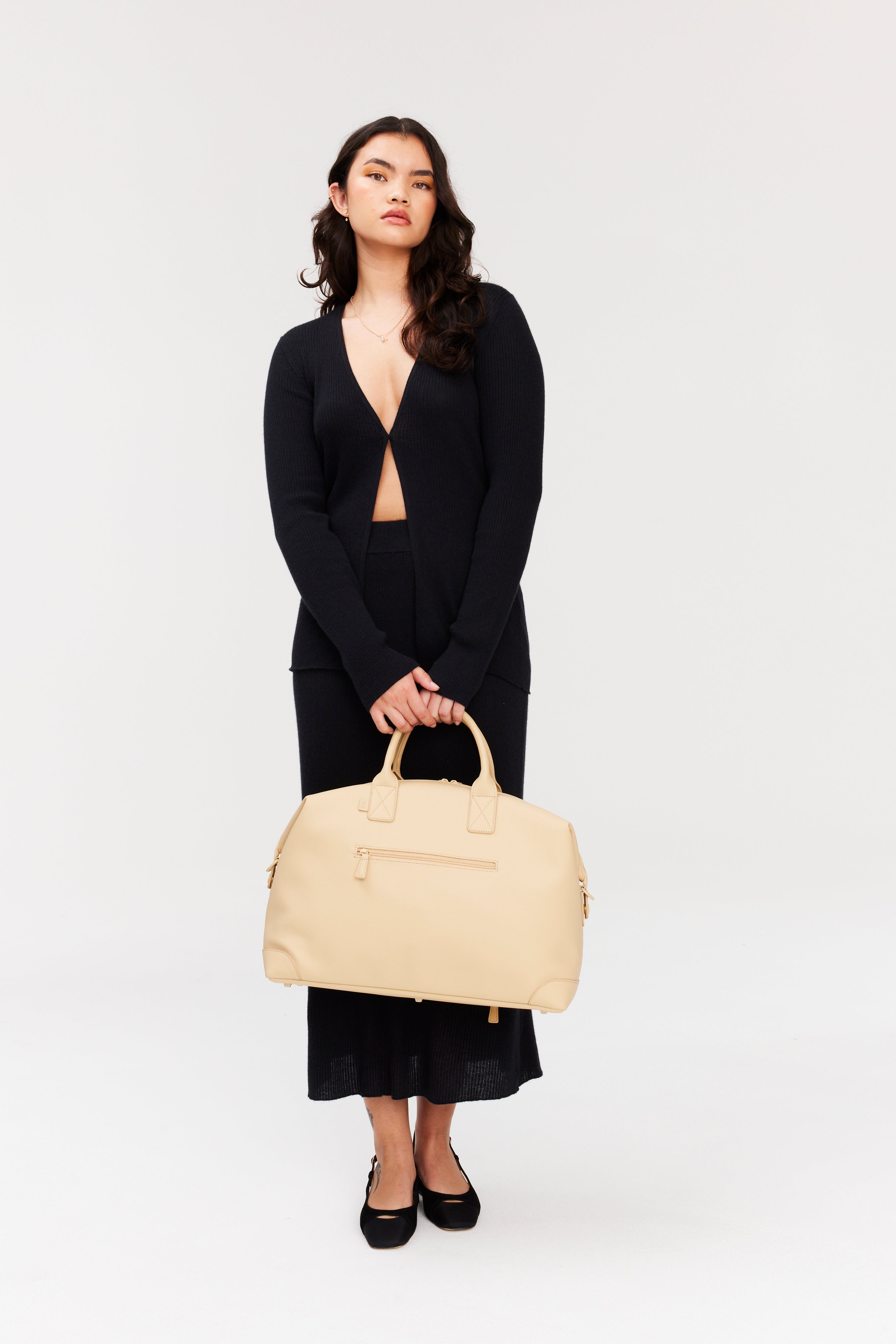 Resale The Premium Duffle in Beige